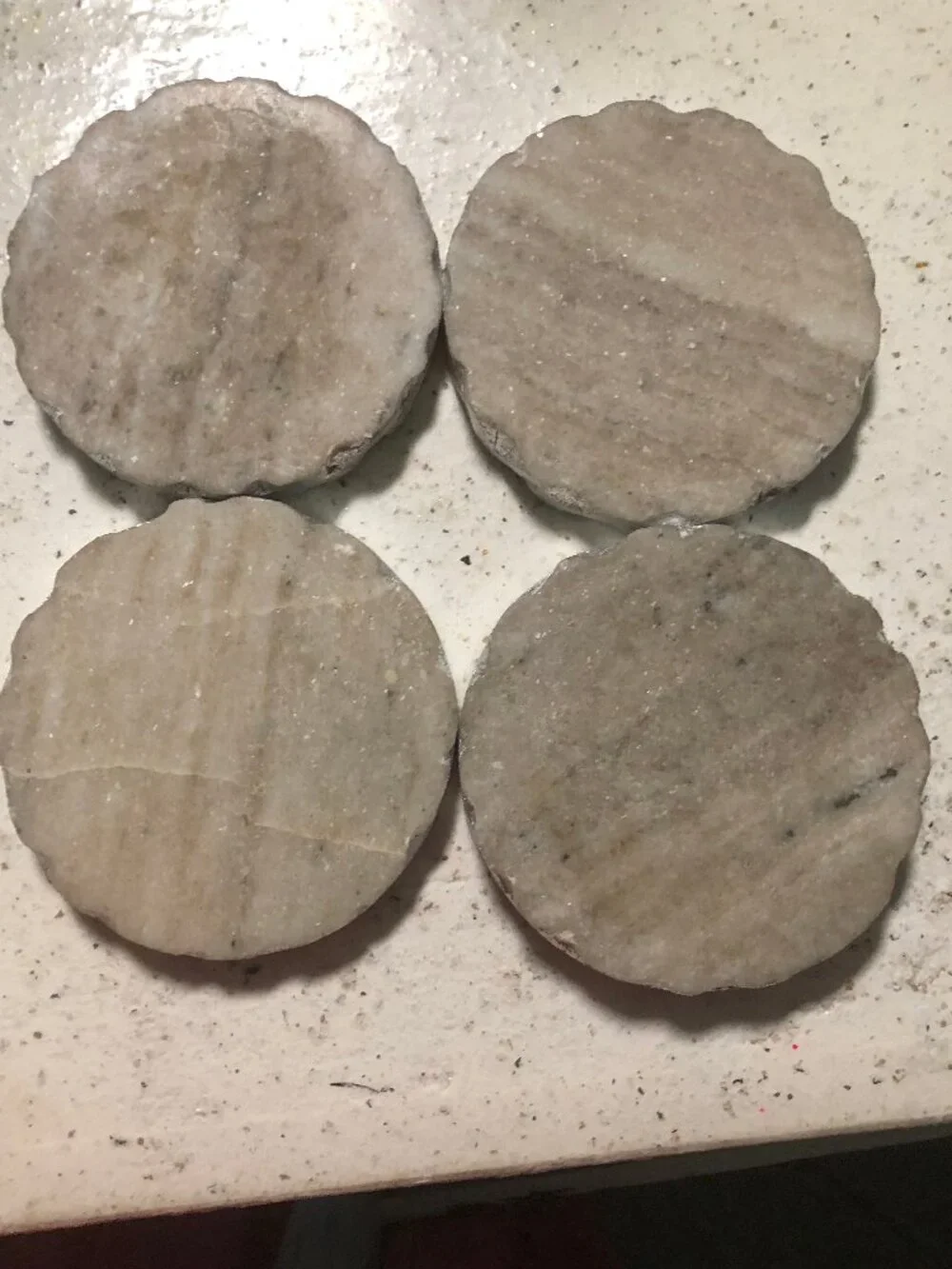 4 Marble coasters with silver trim